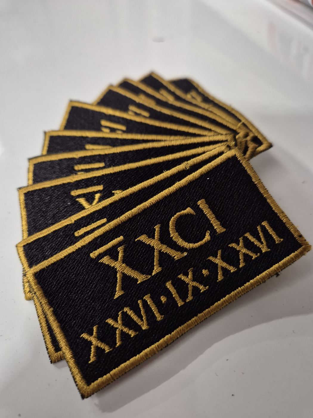 Embroidered patches with gold borders