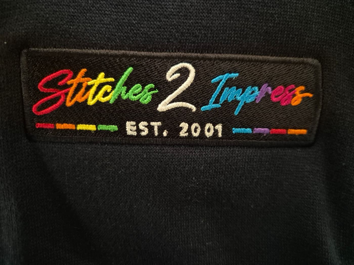 Stitches 2 Impress embroidered patch logo